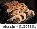 Shrimp grilled on an electric grill. 61303861