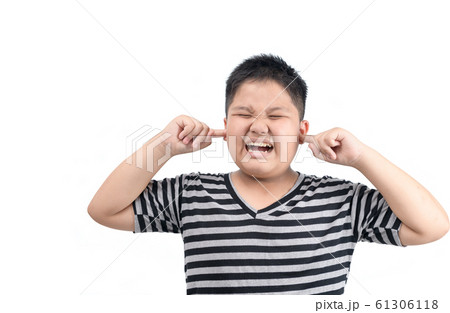 Obese fat boy covering ears ignoring annoying loud 61306118