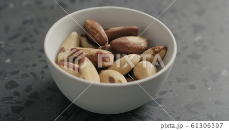 brazil nuts in white bowl on terrazzo countertop brazil nuts in white bowl on terrazzo countertop 61306397