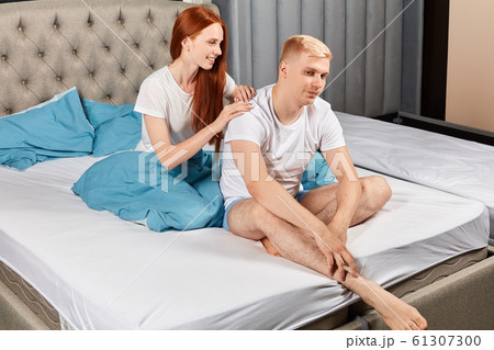 positive beautiful cunning woman telling compliments to her boyfriend positive beautiful cunning woman telling compliments to her boyfriend 61307300