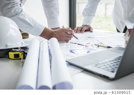 Construction engineering or architect discussing a 61309015