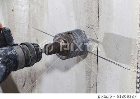 drill hole for electrical outlet outlet, special power tool drill. drill hole for electrical outlet outlet, special power tool drill. 61309337