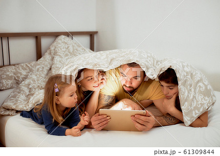 beautiful family enjoy spending time together at home beautiful family enjoy spending time together at home 61309844