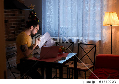 man work at home with laptop man work at home with laptop 61310203
