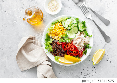 Chicken meat lunch bowl with fresh salad leaves, 61311575