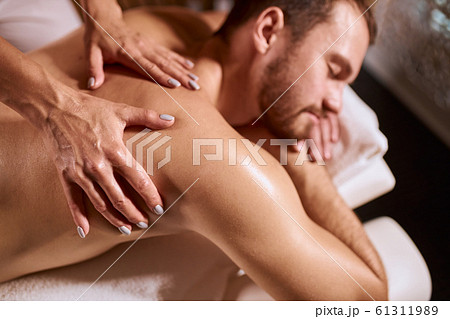 Portrait of man having relaxation massage Portrait of man having relaxation massage 61311989