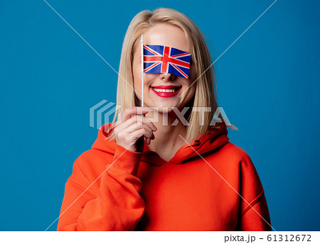 beatiful girl holds British flag in hand beatiful girl holds British flag in hand 61312672