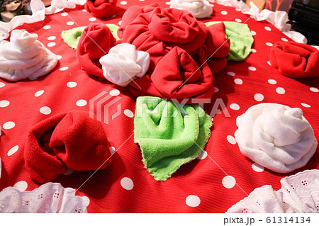 Red and white soft flowers of cloth in the form Red and white soft flowers of cloth in the form 61314134