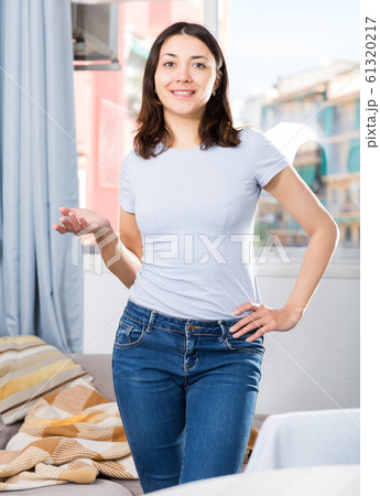 Girl is using various poses having good time in home interior Girl is using various poses having good time in home interior 61320217
