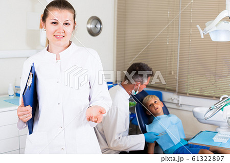 Nurse in uniform is meeting new client Nurse in uniform is meeting new client 61322897