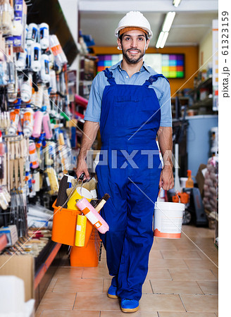 Satisfied workman in hardware store Satisfied workman in hardware store 61323159
