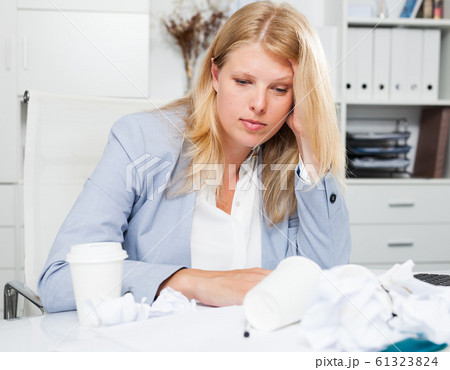 Frustrated tired businesswoman Frustrated tired businesswoman 61323824