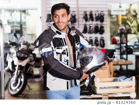 customer posing in jacket with helmet 61324360