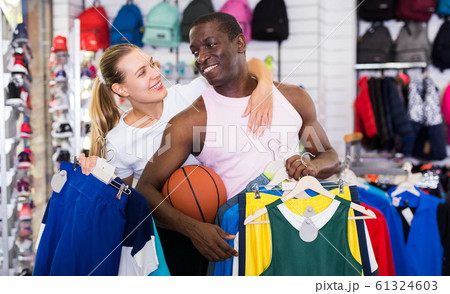 Couple buying sportswear Couple buying sportswear 61324603