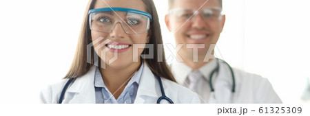 Group medicine doctors in protective googles portrait 61325309