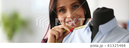 Joyful female tailor Joyful female tailor 61325466