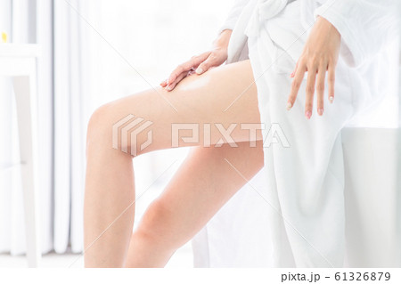 body care woman apply lotion 61326879