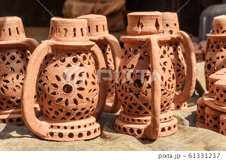 Pottery on the street in Dharavi Slum at Mumbai. Pottery on the street in Dharavi Slum at Mumbai. 61331237
