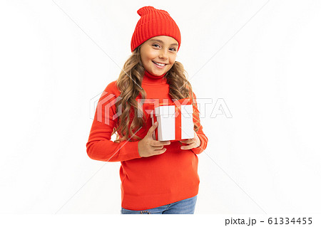 Beautiful caucasian girl holds a white box with gift and has a lot of emotions isolated on white 61334455