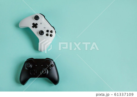 White and black two joystick gamepad, game console 61337109