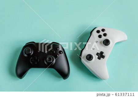 White and black two joystick gamepad, game console 61337111