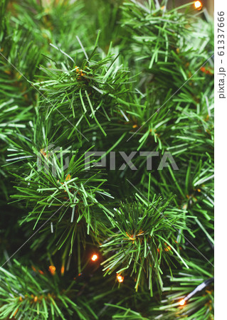 Green branches of plastic not natural christmas Green branches of plastic not natural christmas 61337666