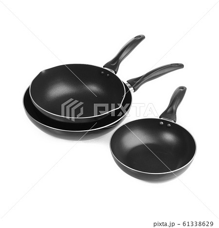 pan or metal frying pan on a background new. pan or metal frying pan on a background new. 61338629