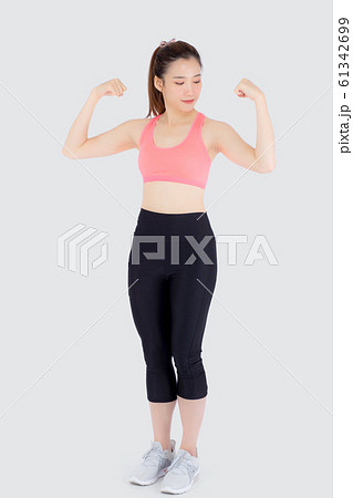Beautiful portrait young asian woman wear sport clothes have strong and muscle with health Beautiful portrait young asian woman wear sport clothes have strong and muscle with health 61342699