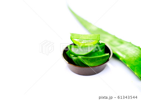 Aloe in cup isolated on empty white table 61343544