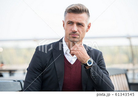 Success is his middle name. Handsome man wear Success is his middle name. Handsome man wear 61343545