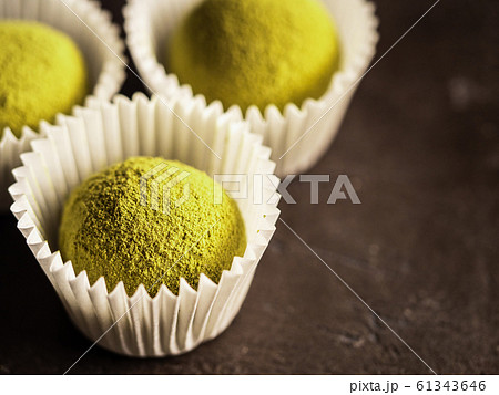 Homemade truffles with matcha tea powder,copyspace 61343646