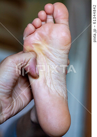 young girl's toes are healthy and beautiful. 61344842