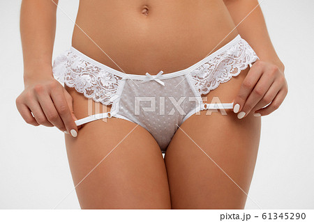 Faceless seductive female touching lingerie in 61345290