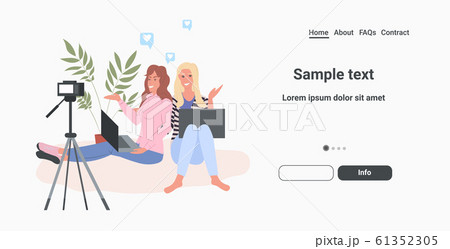 bloggers couple recording video blog with digital camera on tripod women using laptops streaming live social network blogging concept horizontal full length copy space 61352305