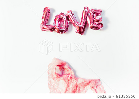 Love concept. Inflatable pink balloon with letters Love concept. Inflatable pink balloon with letters 61355550