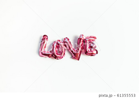 Love concept. Inflatable pink balloon with letters Love concept. Inflatable pink balloon with letters 61355553