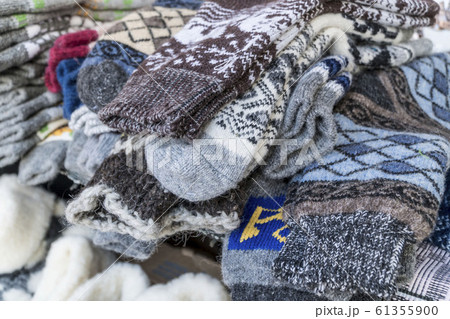 handmade, knitted woven socks as a background handmade, knitted woven socks as a background 61355900