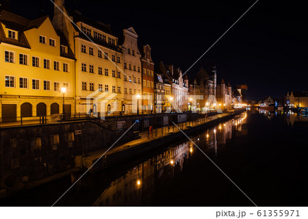 evening streets of old Gdansk, bridge over the main river, central tourist street 61355971