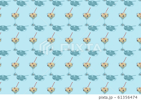 Cocktail glass with eyeballs pattern with shadows. Cocktail glass with eyeballs pattern with shadows. 61356474