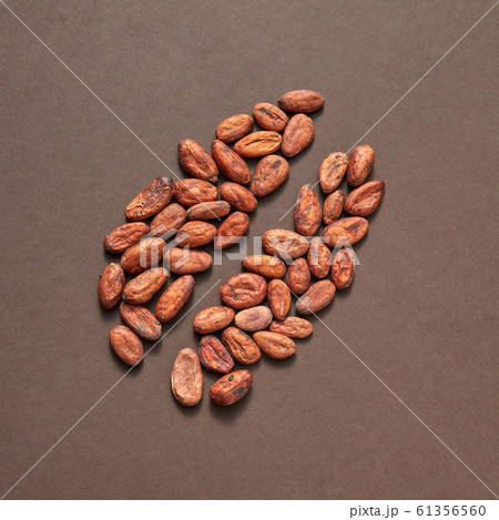 Natural cocoa peas in the shape of big bean. Natural cocoa peas in the shape of big bean. 61356560