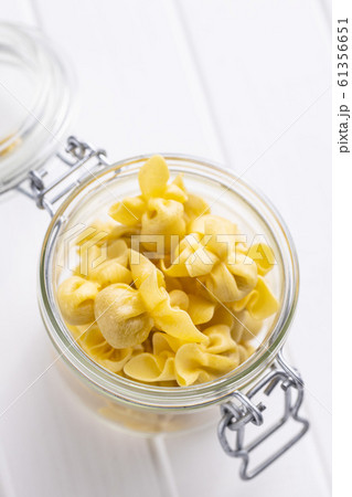 Italian stuffed pasta. Sacchettini pasta. Italian stuffed pasta. Sacchettini pasta. 61356651