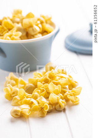 Italian stuffed pasta. Sacchettini pasta. Italian stuffed pasta. Sacchettini pasta. 61356652