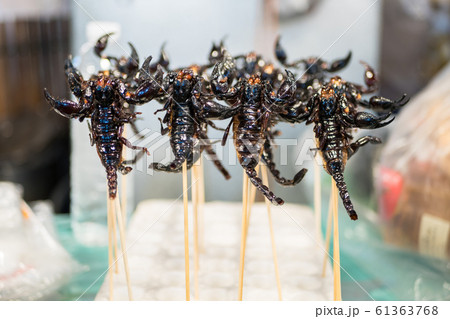 Deep fried scorpions selling at the Bangkok Deep fried scorpions selling at the Bangkok 61363768