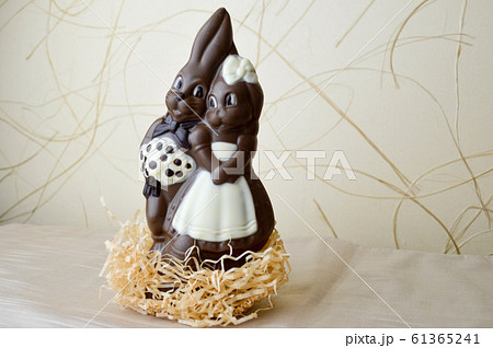 Two chocolate rabbits. Two tasty, embracing Two chocolate rabbits. Two tasty, embracing 61365241