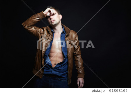 Man in leather coat. stylish sexy Handsome Boy Man in leather coat. stylish sexy Handsome Boy 61368165