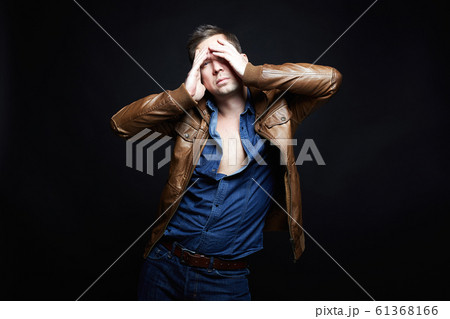 Fashionable young Man in leather coat Fashionable young Man in leather coat 61368166