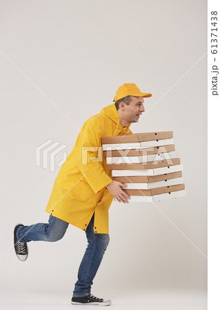 Pizza Delivery Guy Running on White Pizza Delivery Guy Running on White 61371438