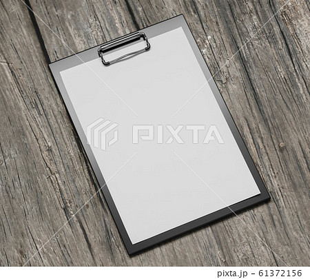 plastic clipboard with blank paper sheet isolated on wooden background 3d render illustration plastic clipboard with blank paper sheet isolated on wooden background 3d render illustration 61372156