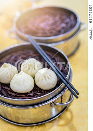 Delicious traditional chinese Baozi buns Delicious traditional chinese Baozi buns 61373804