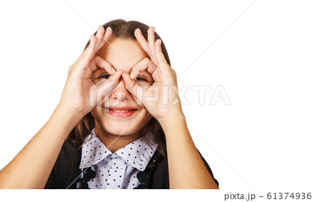 teen smiling brunette teen girl showing glasses 61374936